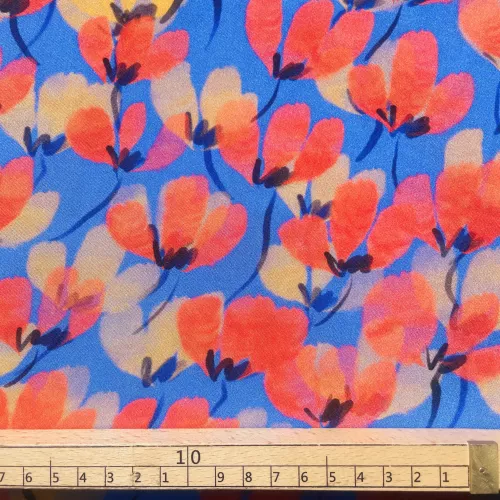 De jolis coquelicots rouges sur fond bleu roy