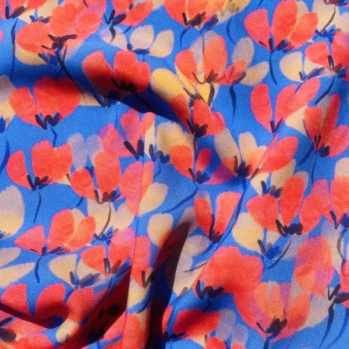 De jolis coquelicots rouges sur fond bleu roy